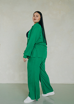 картинка Брюки палаццо с разрезами зеленого цвета от магазина Одежда+