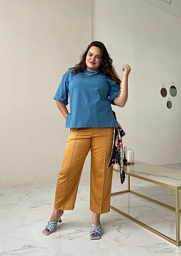 картинка Брюки длиной 7/8 горчичного цвета от магазина Одежда+