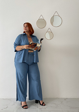 картинка Брюки палаццо с разрезами голубого цвета от магазина Одежда+